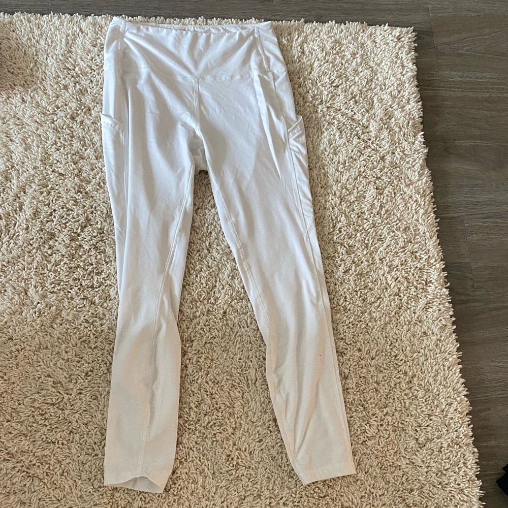 SOLMI premium activewear yoga leggings, dual side pocket, never worn